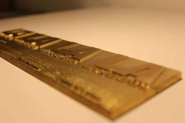 Brass die