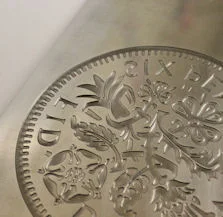 Embossed coin detail